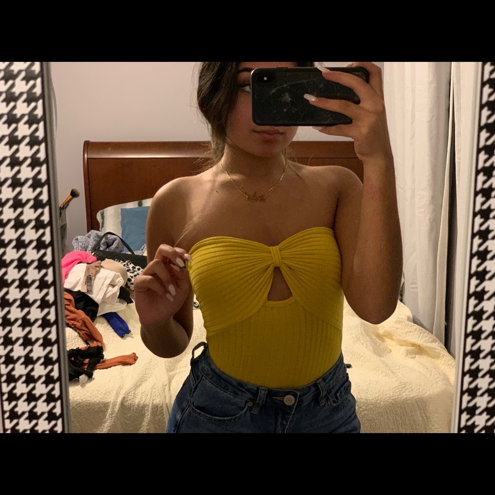 yellow bodysuit